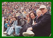 Tom Sadge and his brothers-in-law (wife Marion's family) watch from the sidelines during the November 2000 Philadelphia Eagles vs. the Dallas Cowboys game at Veterans' Stadium in Philadelphia. Tom performed as Neil Diamond during the Philly Eagles' half-time show. Photo: Sadge Family