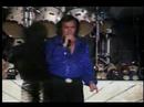 Celebrity impersonator and Neil Diamond tribute artist sings Sweet Caroline on YouTube.com