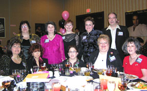 Party goers celebrate Neil Diamond's birthday at the Embassy Suites in Chicago, IL in late January 2005. Celebrants include:Back: Lois Labendz, Nancy Gentes, Kathy Shue, Ginny Gnadt, Mitch Augustover; Front: Caryn Miglio, Rosie Spicer, Moira Scott, Linda Wieloch, Sally Davis 