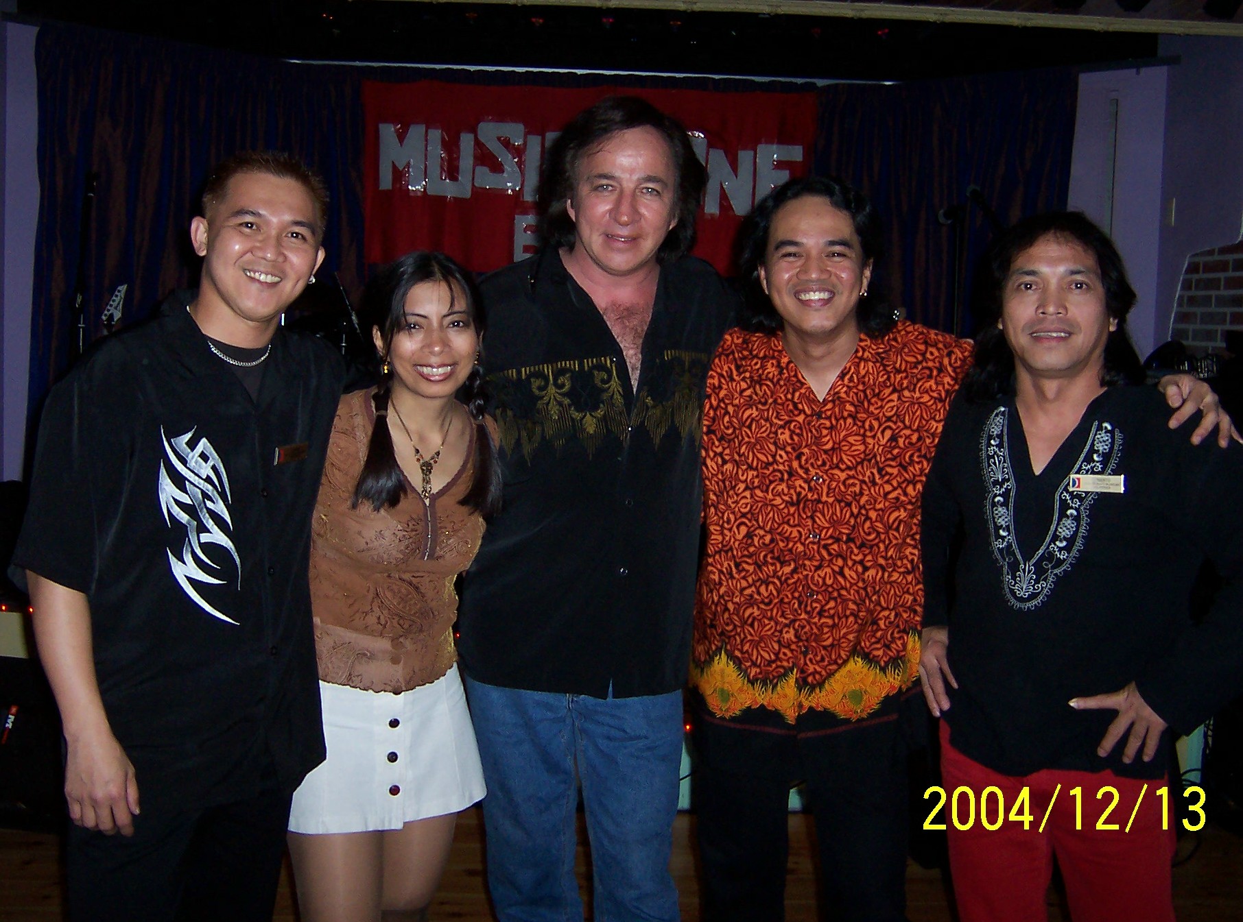 Tom Sadge is pictured aboard Carnival Cruise Line's Legend with the fabulous band which performed aboard the ship nightly.