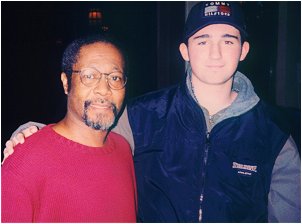 Tom Sadge's son Fred with Neil Diamond percussionist Vince Charles.